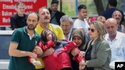 Relatives of workers at the state-owned Mechanical and Chemical Industry Corporation on the outskirts of Ankara, Turkey, June 10, 2023. An explosion there killed five workers.