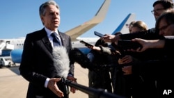 U.S. Secretary of State Antony Blinken talks to reporters prior to boarding his aircraft to depart Washington to travel to the Middle East and Asia at Andrews Air Force Base, Maryland, Nov. 2, 2023.