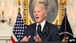 US President Joe Biden speaks at the White House in Washington on Feb. 8, 2024.