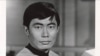 Actor George Takei, portraying Lieutenant Sulu of the USS Enterprise from the TV series Star Trek.