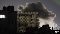 Smoke rises over buildings amid Israeli bombardment in Rafah in the southern Gaza Strip as fighting continues between Israel and the Palestinian Hamas group, Feb. 3, 2024.