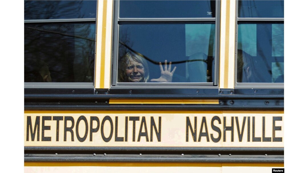 A child weeps while on the bus leaving The Covenant School, following a mass shooting at the school in Nashville, Tennessee, March 27, 2023. (Nicole Hester/USA Today Network via Reuters)