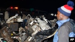 Wreckage of vehicles after Friday's accident, July 1, 2023. A truck rammed into several other vehicles and market traders in western Kenya, police said.