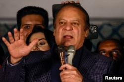 FILE - Former Pakistani Prime Minister Nawaz Sharif speaks at the party office of the Pakistan Muslim League (Nawaz), at Model Town in Lahore, Pakistan, Feb. 9, 2024.