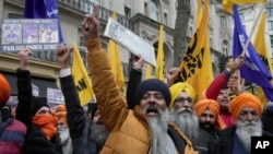 FILE - Sikh protesters demonstrate outside of the Indian High Commission in London on March 22, 2023.