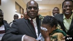 Gilbert Deya (L) celebrates outside the court room with his followers after he was acquitted by the Milimani high courts in Nairobi on July 17, 2023. 