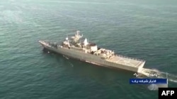 An image grab from footage obtained from Iranian State TV IRIB, Dec. 27, 2019 shows a view of the Islamic Republic of Iran Navy frigate 'Sahand' during Iran-Russia-China joint naval drills in the Indian Ocean and the Gulf of Oman. (Photo by IRIB TV / AFP)