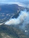 This handout image provided by the BC Wildfire Service on June 5, 2023, shows an aerial view of the Pigeon Creek wildfire near Peachland, British Columbia, Canada. 