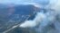 This handout image provided by the BC Wildfire Service on June 5, 2023, shows an aerial view of the Pigeon Creek wildfire near Peachland, British Columbia, Canada. 