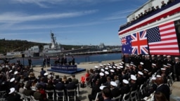 资料照：美国、英国和澳大利亚领导人在圣迭戈美国海军洛玛角基地宣布推进“澳英美安全协议”核潜艇方案。（2023年3月13日）