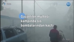 Gazzeliler mülteci kampında sis bombalarından kaçtı
