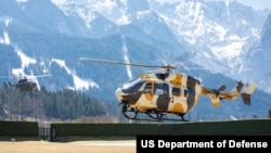 UH-72 Lakota helicopters prepare to land at Sheridan Barracks in Garmisch-Partenkirchen, Germany, April 1, 2020.