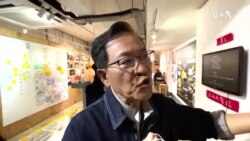 香港碼頭工潮領袖講解機手不人道工作環境