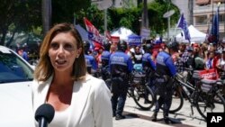 FILE - Alina Habba, a lawyer for former President Donald Trump, speaks outside the Wilkie D. Ferguson Jr. U.S. Courthouse, in Miami, Florida, June 13, 2023.