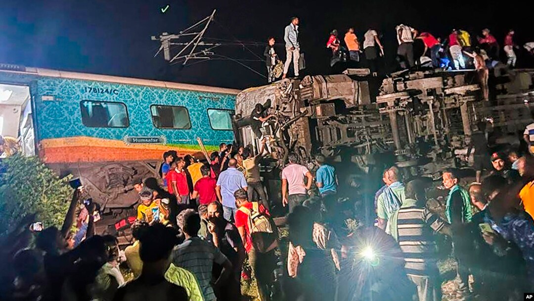 Rescuers work at the site of passenger trains that derailed in Balasore district, in the eastern Indian state of Orissa, June 2, 2023. (Press Trust of India via AP)