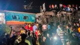 Rescuers work at the site of passenger trains that derailed in Balasore district, in the eastern Indian state of Orissa, June 2, 2023. (Press Trust of India via AP)