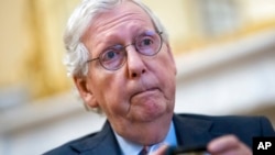 FILE - Senate Minority Leader Mitch McConnell, R-Ky., discusses NATO expansion and other issues during an Associated Press interview in his office at the Capitol in Washington, Aug. 3, 2022.