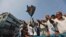 FILE - Activists of the Bangladesh Nationalist Party gather for a protest in Dhaka, Bangladesh, Oct. 28, 2023.