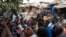 FILE - A man previously detained at the Rebeuss prison in connection with the recent wave of unrest speaks to the press upon his release in Dakar on Feb. 19, 2024. 