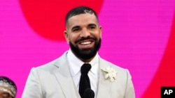 FILE - Drake appears at the Billboard Music Awards in Los Angeles on May 23, 2021. He is among the artists whose music Universal Music Group said it would no longer allow on the platform in a licensing dispute. 