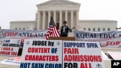 A person protests outside of the Supreme Court in Washington, Thursday, June 29, 2023. (AP Photo/Jose Luis Magana)