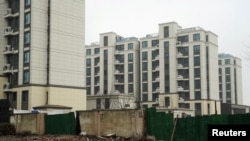 FILE: Perumahan yang sedang dibangun oleh pengembang Country Garden di Shanghai, Cina, 29 Februari 2024. (REUTERS/Nicoco Chan)