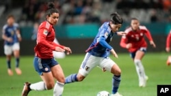 Costa Rica's Raquel Rodriguez, left, and Japan's Hikaru Naomoto compete for the ball during the Women's World Cup Group C soccer match between Japan and Costa Rica in Dunedin, New Zealand, July 26, 2023.