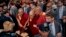The Dalai Lama, center, arrives at Park Hyatt hotel as supporters greet him, in New York, June 23, 2024. 
