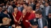 2024年6月23日，达赖喇嘛（中）抵达纽约柏悦酒店，支持者们向他表示欢迎。