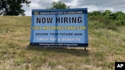 A "Now Hiring" sign is shown at the entrance to a Missouri Department of Corrections prison facility, July 13, 2023, in Fulton, Missouri.