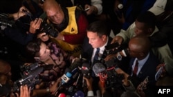John Steenhuisen, leader of the Democratic Alliance, addresses the media after signing a governing agreement with the ruling African National Congress (ANC) during the first sitting of the New South African Parliament in Cape Town, June 14, 2024.