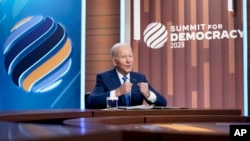 President Joe Biden speaks during a Summit for Democracy virtual plenary in the South Court Auditorium on the White House campus, in Washington, March 29, 2023.