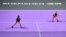 FILE - Taiwan's Hsieh Su-we, left, and Czech Republic's Barbora Strycova play in a doubles final at the WTA Tour tournament at Shenzhen, China, in 2019 - the last year women's tennis' governing body held tournaments in China. 