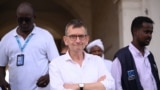 FILE: Volker Perthes (C), Special Representative of the U.N. Secretary-General for Sudan and Head of the U.N. Integrated Transition Assistance Mission in Sudan, oversees the evacuation of internationally-recruited personnel in Port Sudan on April 24, 2023. 