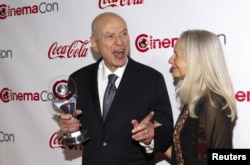 FILE - Actor Alan Arkin (L) and his wife actress Suzanne Newlander Arkin pose during the CinemaCon Big Screen Achievement Awards at Caesars Palace in Las Vegas, Nevada April 23, 2015.