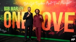 FILE - Kingsley Ben-Adir, left, the star of "Bob Marley: One Love," poses with Marley's son Ziggy at the premiere of the film, in Los Angeles, Feb. 6, 2024. 