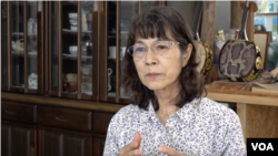 Fumie Kano, who runs a Yonaguni hostel, is opposed to the island's militarization. (W. Gallo/VOA)