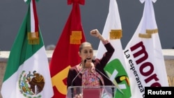 FILE - Claudia Sheinbaum of Mexico's ruling Morena party, a presidential candidate in the upcoming June 2 general election, speaks in Mexico City, Mexico, Feb. 18, 2024.
