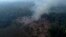 FILE - A forest burns in the Amazon in the municipality of Manaquiri in Brazil's Amazonas state, Sept. 6, 2023.