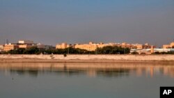 FILE - The U.S. Embassy is seen from across the Tigris River in Baghdad, Iraq, Jan. 3, 2020. A rocket attack at the sprawling U.S. Embassy in Baghdad on Dec. 8, 2023, caused minor material damage but no casualties, U.S. and Iraqi officials said.