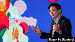 Wakil Perdana Menteri Singapura dan Menteri Keuangan Lawrence Wong menghadiri "Google untuk Singapura", sebuah acara merayakan tahun ke-15 perusahaan tersebut di negara tersebut, di kantor Google, di Singapura, 23 Agustus 2022. (Foto: REUTERS/Edgar Su)