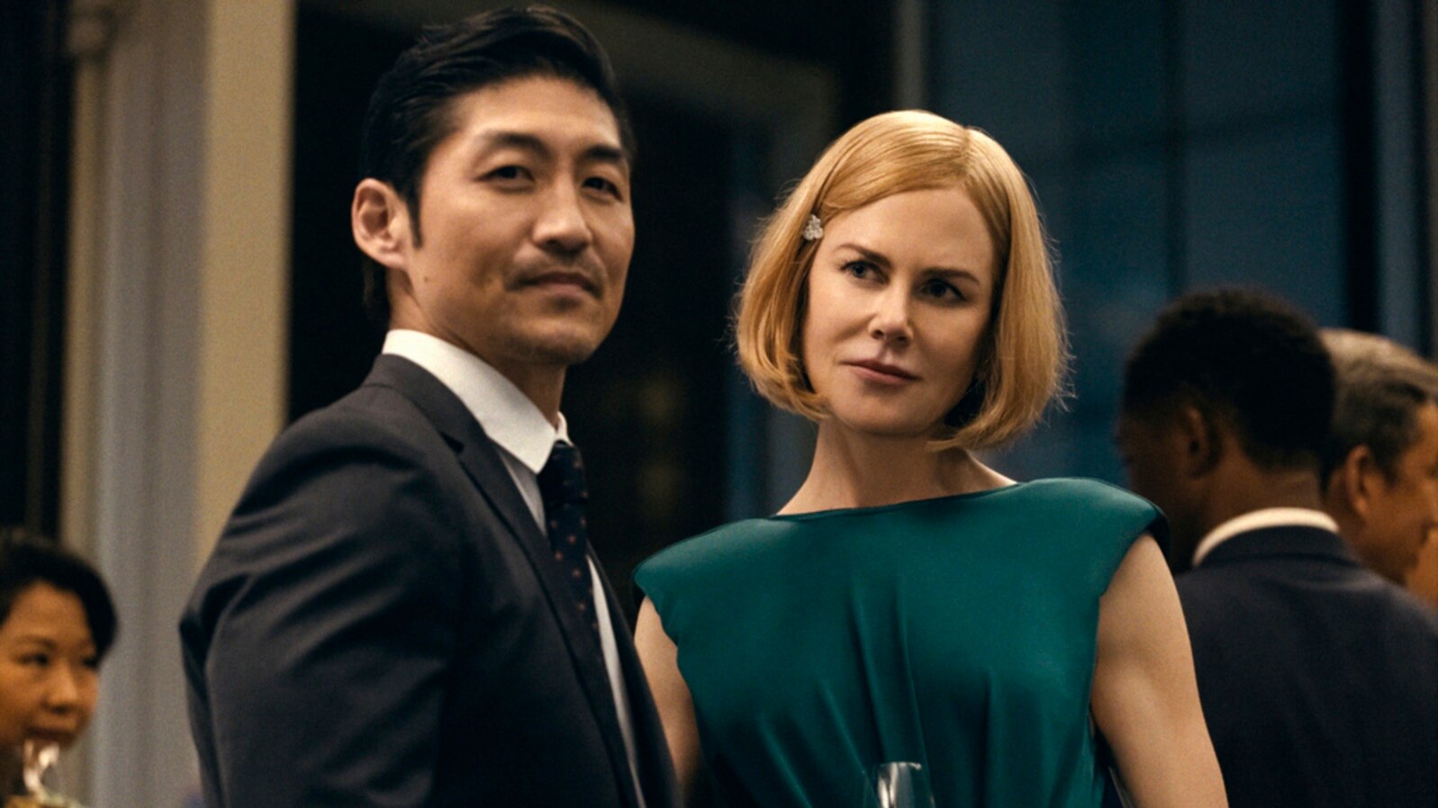 This image released by Prime Video shows Brian Tee and Nicole Kidman in a scene from 'The Expats.' 