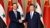  شام کے صدر بشار الاسد کے ساتھ دو طرفہ مذاکرات سے قبل چین کے صدران سے ہاتھ ملا رہے ہیں فوٹو اے پی، 22 ستمبر 2023 
