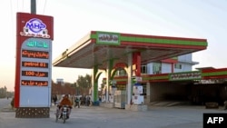 FILE - A gas station is seen in Kandahar, Afghanistan, Sept. 8, 2022. The de facto Taliban regime has increased oil imports from Russia, rising from 246,000 tons in 2022 to more than 710,000 tons in the past 11 months, according to Taliban officials.