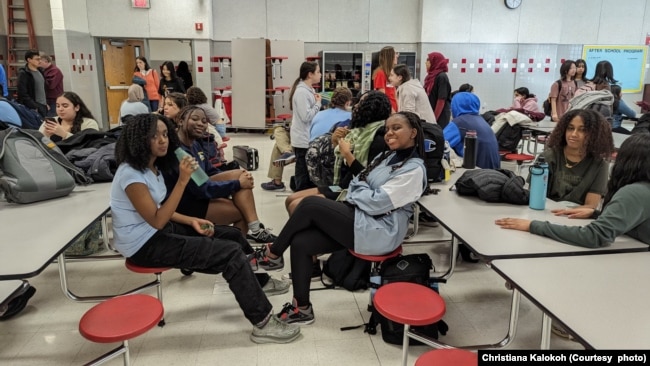 Christiana Kalokoh (middle, left) helps run her school's Bible study club.