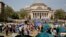 FILE - Student protesters gather inside their encampment on the Columbia University campus, on April 29, 2024, in New York.