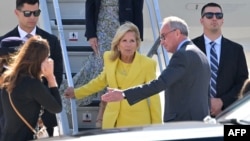 US first lady Jill Biden (C) is welcomed as she arrives to celebrate the US rejoining UNESCO, at the Orly Airport in Orly, Paris' suburb, on July 24, 2023. 