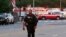 A United States Secret Service officer stands outside the White House grounds, July 2, 2023 in Washington. The White House was briefly evacuated after the Secret Service discovered suspicious powder in a common area of the West Wing.