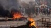 FILE - Senegalese demonstrators protest against the postponement of the Feb. 25 presidential election, in Dakar, Feb. 9, 2024.