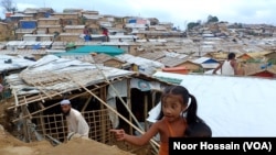 Two Rohingya children at the sprawling Balukhali refugee camp in Cox's Bazar, Bangladesh, June 9, 2023. (Noor Hossain/VOA)